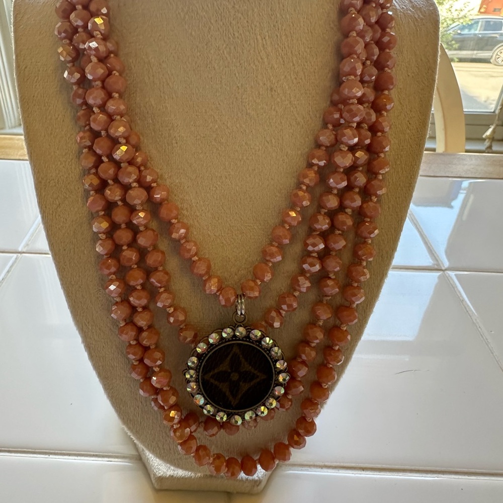 Upcycled 4 strand Elegant peach colored Beaded Necklace with Pendant